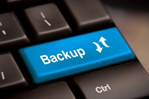 Backup Computer Key In Blue For Archiving And Storage